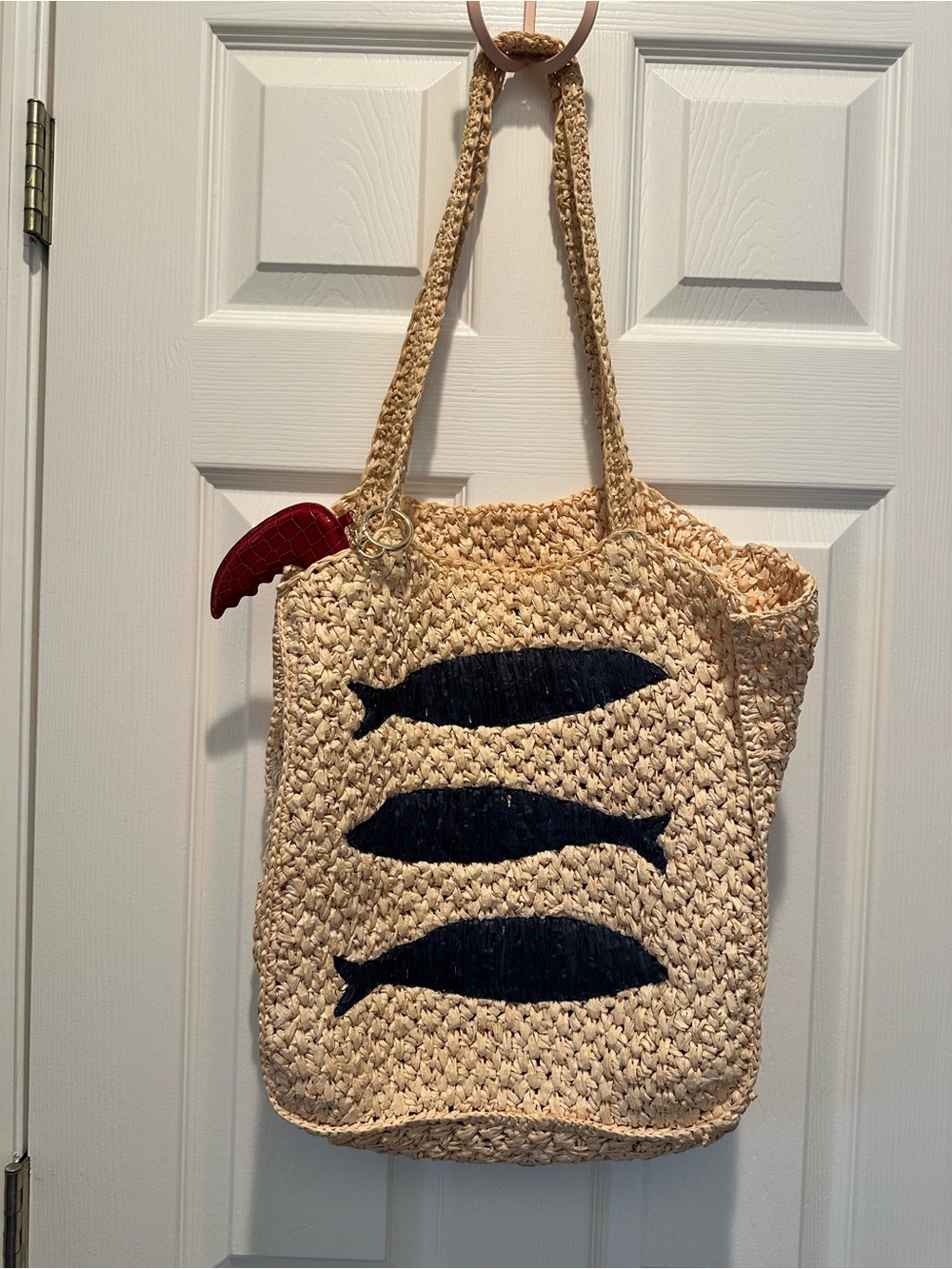 Anthropologie Natural Straw Tote with Navy Fish Motif and Red Charm